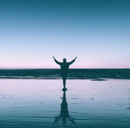 silhouette-photography-of-person-standing-on-body-of-water.jpg silhouette photography of person standing on body of water